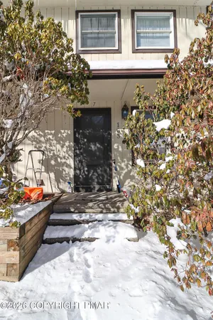 a view of a entryway door of the house