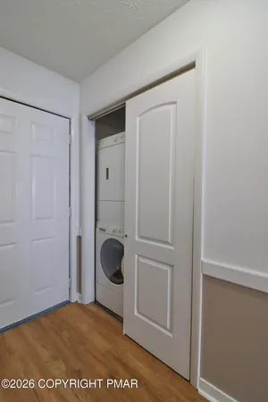 a view of a storage & utility room with a sink