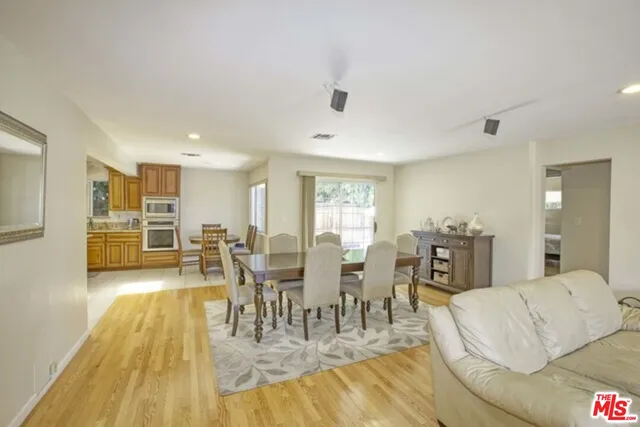 a view of a dining room with furniture