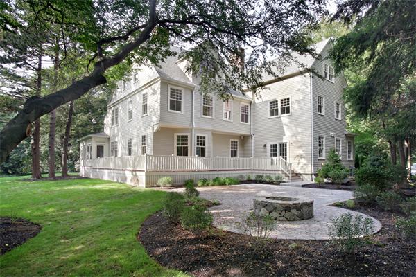 33 Kingsbury Road Newton, MA 02467 - Photo 11 of 12 a view of a white house with a yard