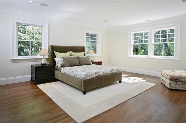 33 Kingsbury Road Newton, MA 02467 - Photo 8 of 12 a bedroom with a bed lamp and window