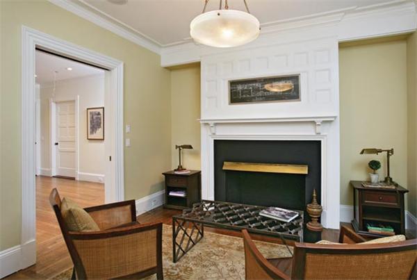 33 Kingsbury Road Newton, MA 02467 - Photo 9 of 12 a living room with furniture a fireplace and a fireplace