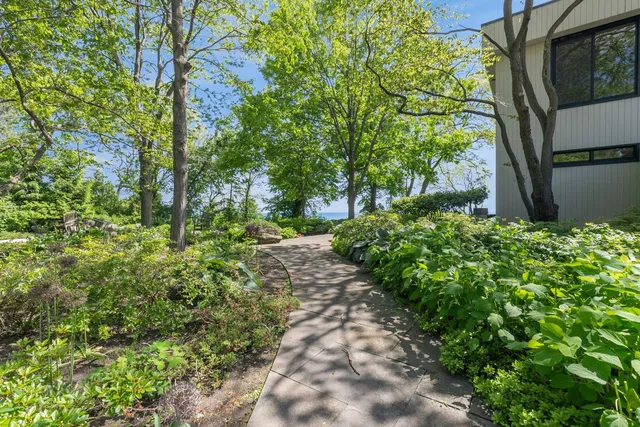 a backyard of a house with lots of green space