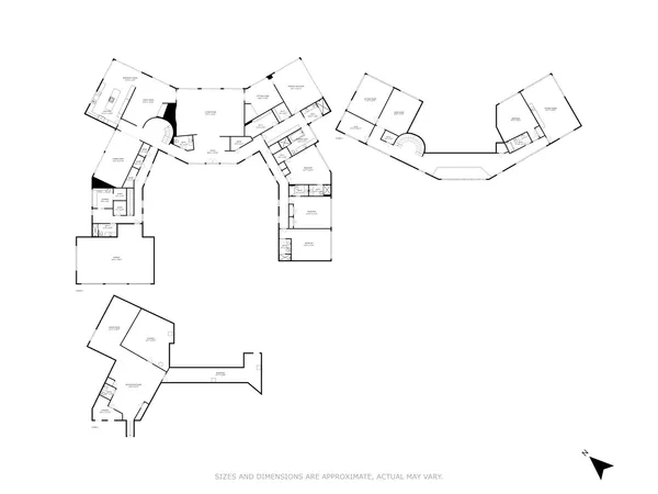 a picture of a room with a white wall and a fan