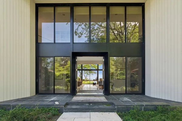 a front view of a house with a porch
