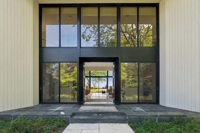 a front view of a house with a porch