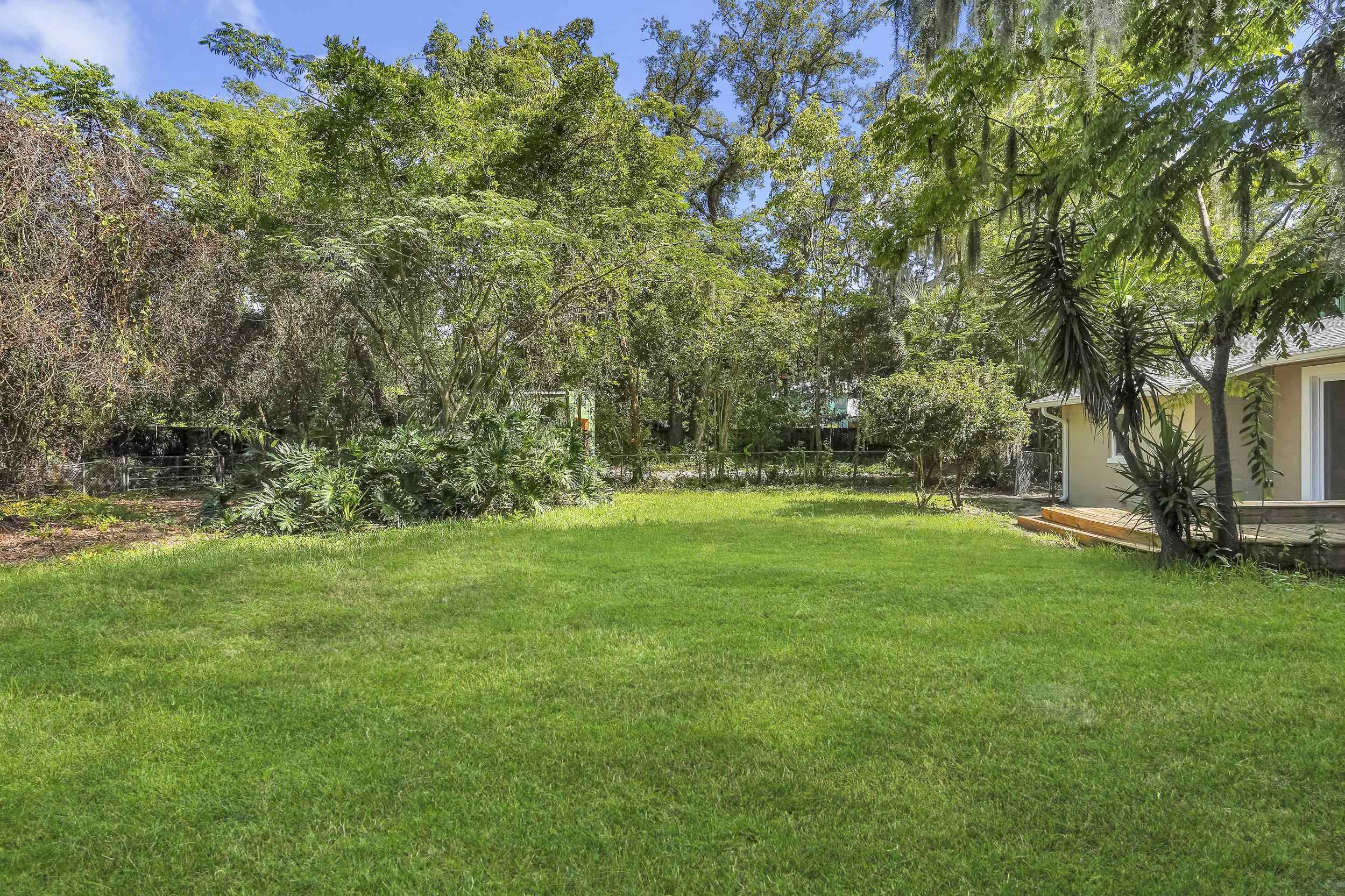 13 Oak Street St. Augustine, FL 32084 - Photo 36 of 39 a view of outdoor space with trees all around