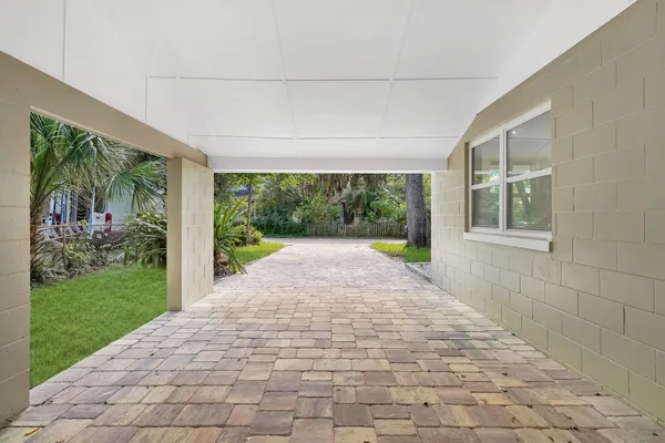 a view of porch with a yard
