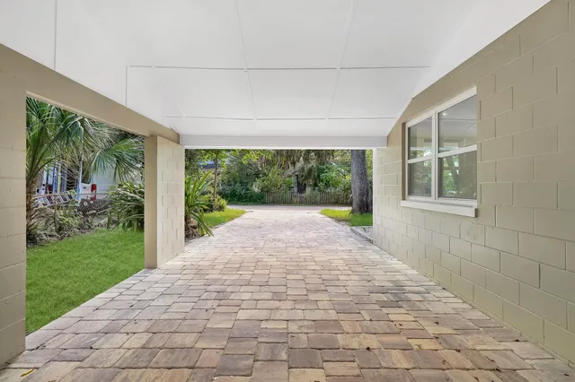 a view of porch with a yard