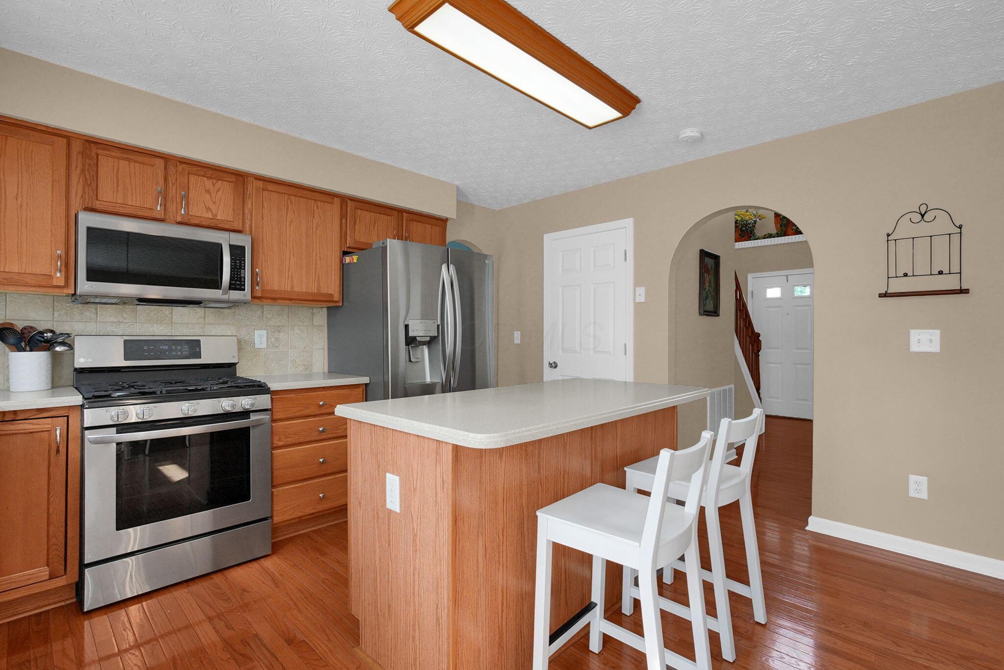 114 Tabilore Loop Delaware, OH 43015 - Photo 12 of 59 Center island with seating