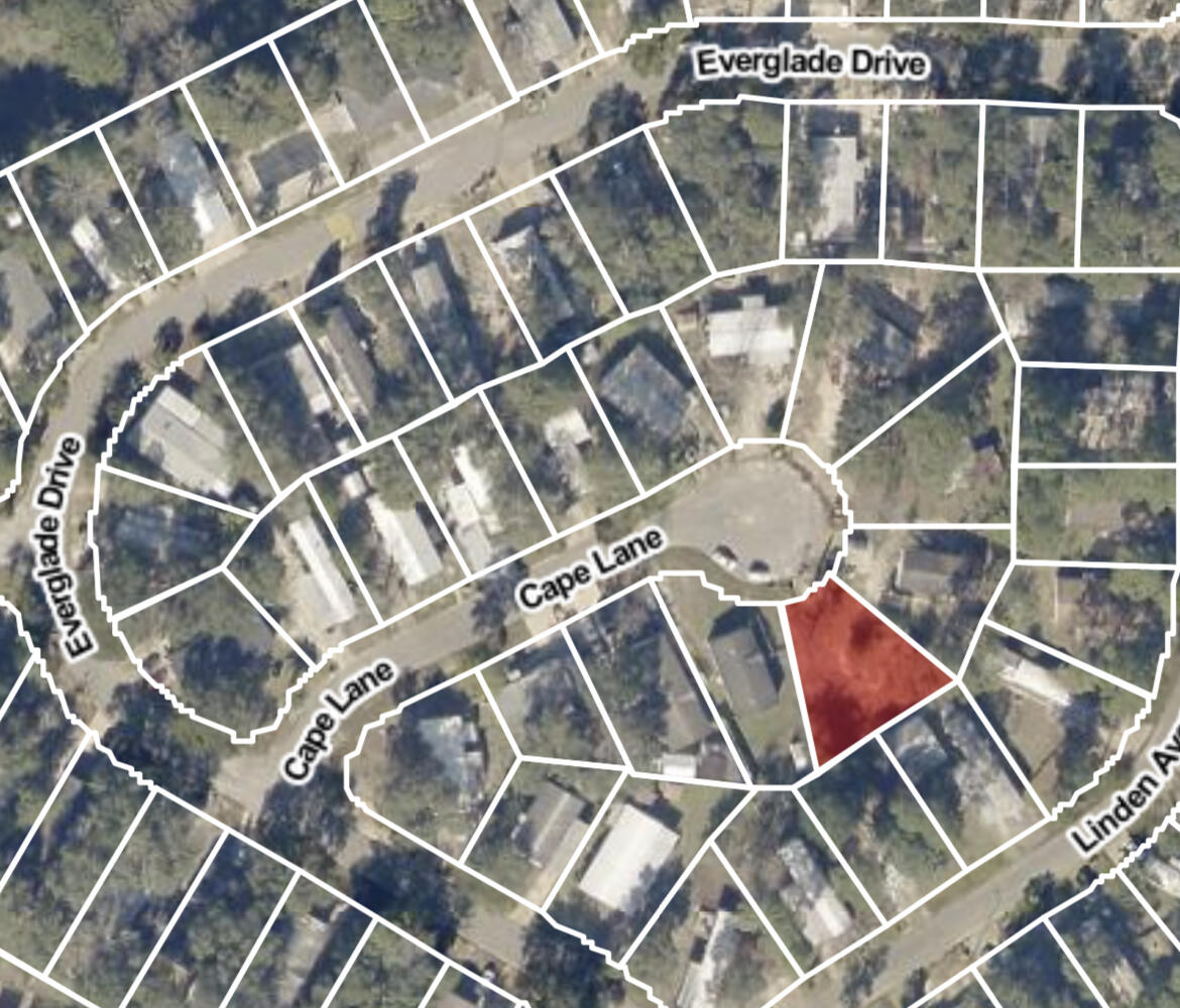 an outdoor space with wooden floor