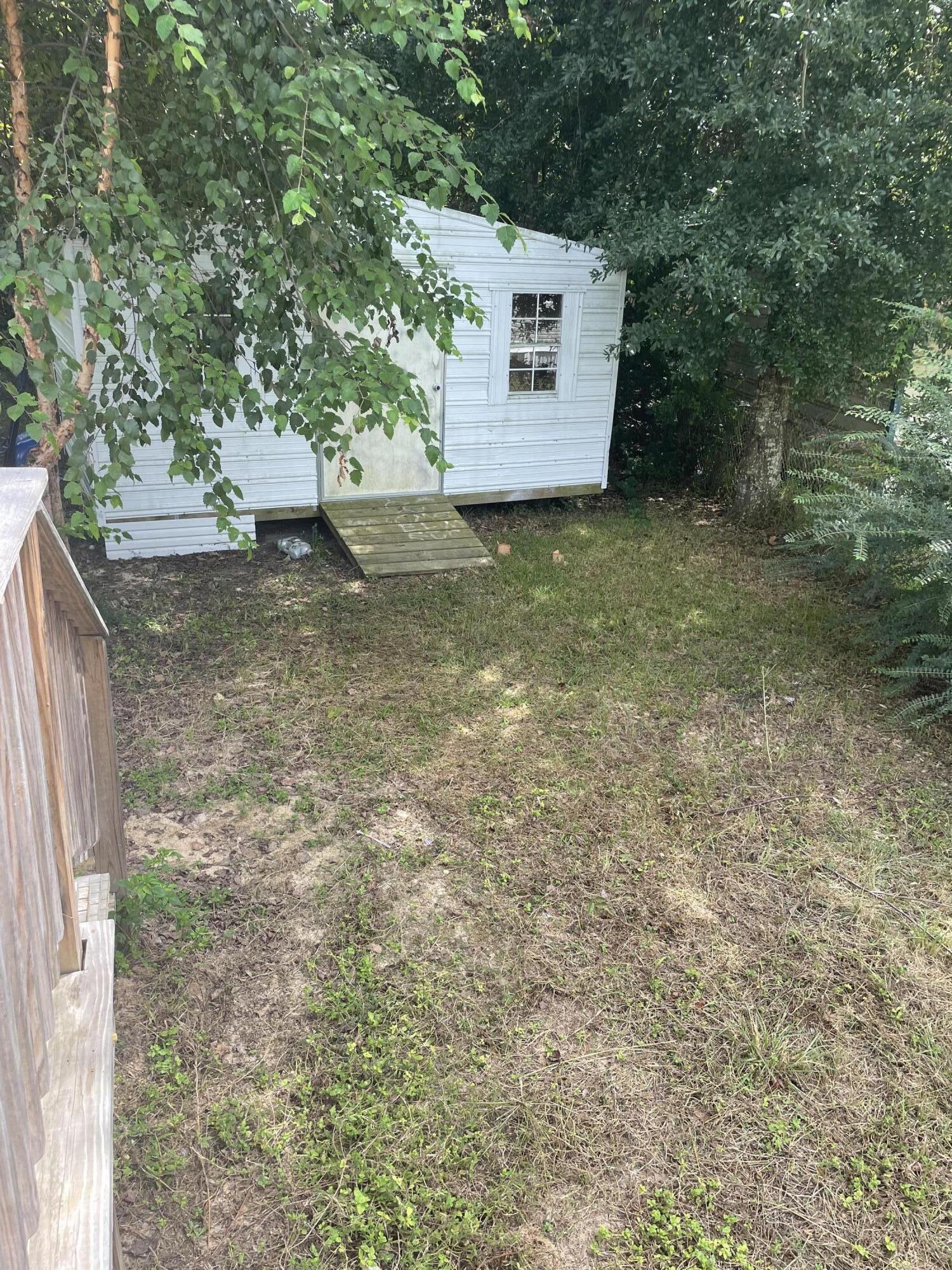 1412 Cape Lane Niceville, FL 32578 - Photo 18 of 23 a view of a outdoor space with seating area