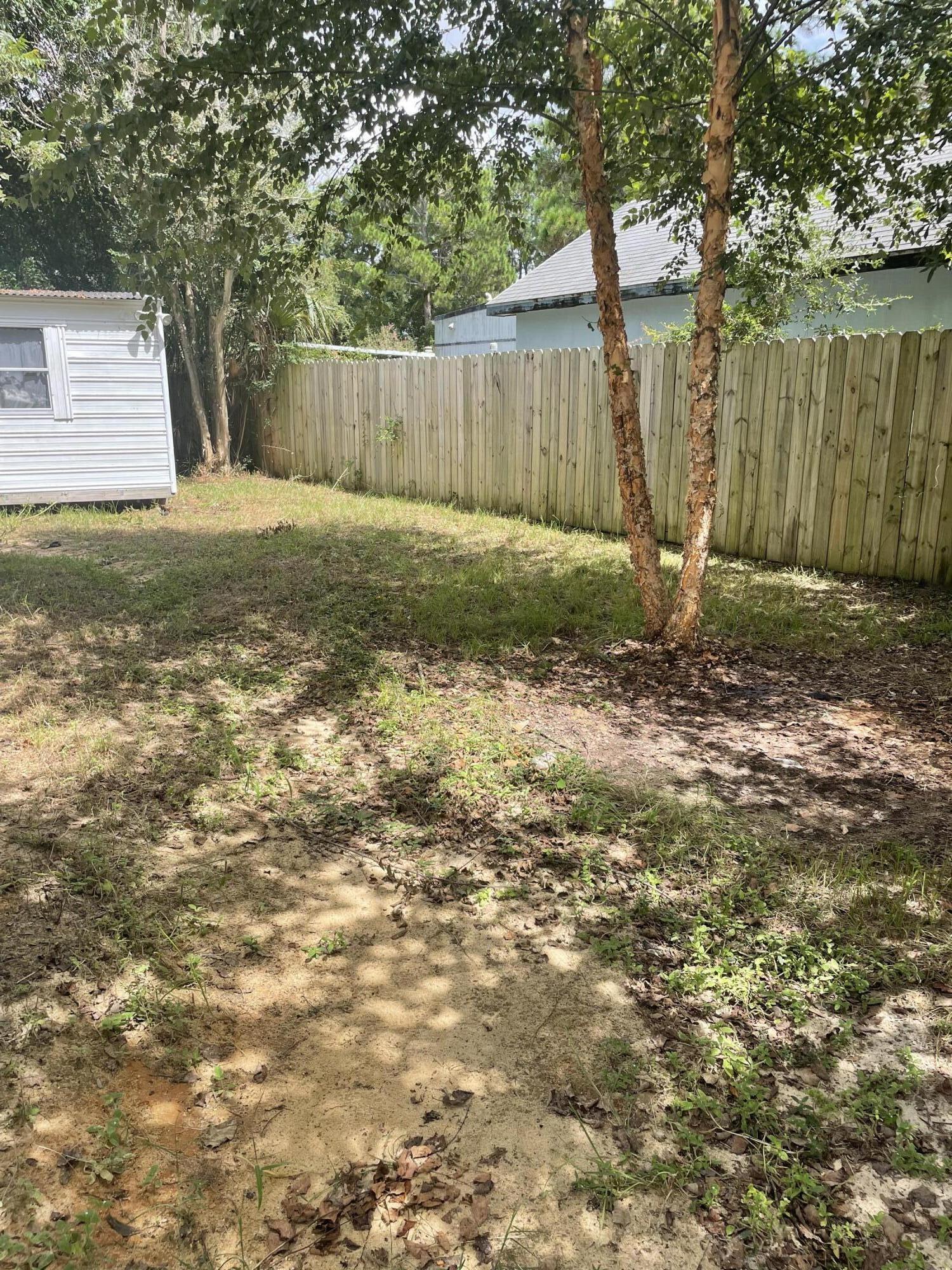1412 Cape Lane Niceville, FL 32578 - Photo 19 of 23 a view of a backyard
