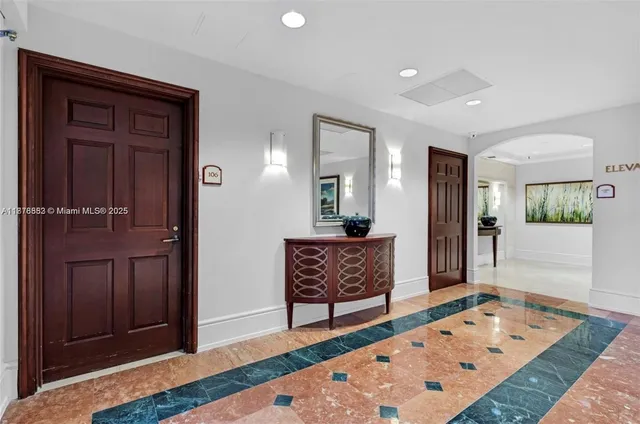 a view of room with window and wooden floor