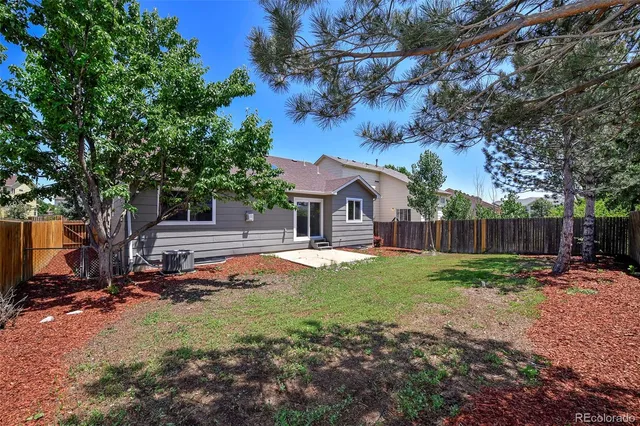 a view of backyard with green space