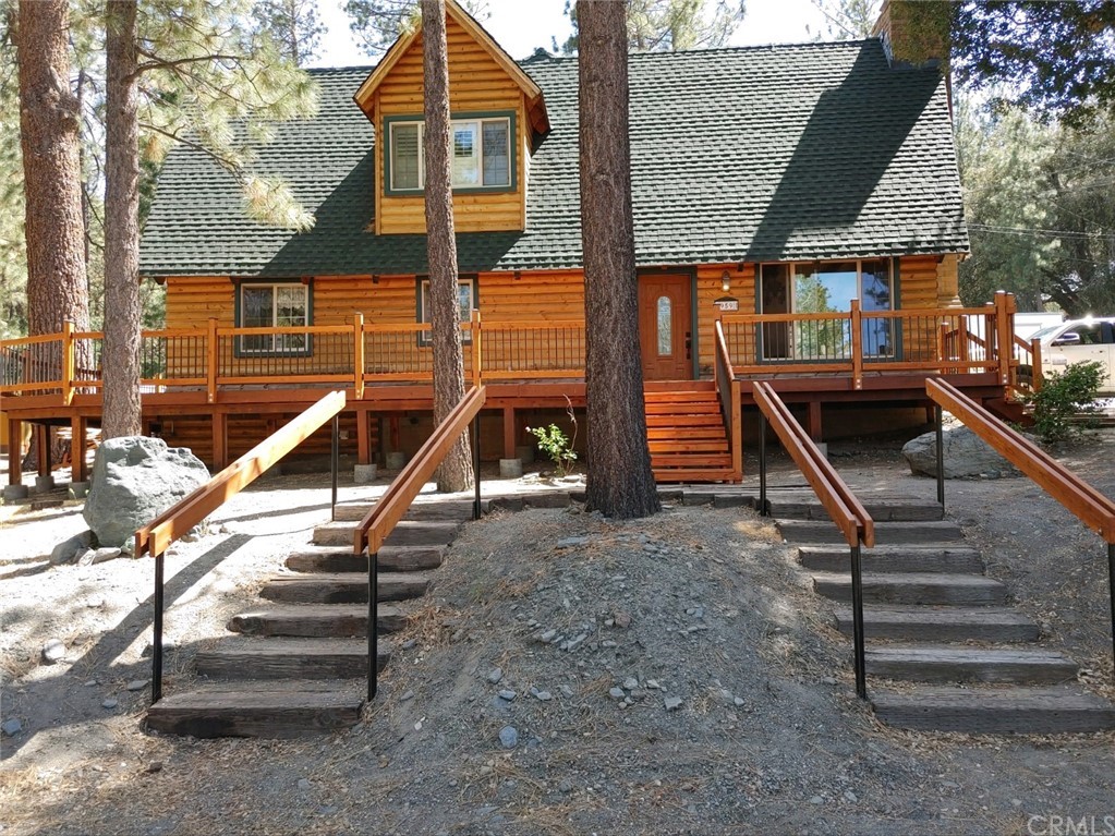 959 Quail Road Wrightwood, CA 92397 - Photo 1 of 1 a front view of a house with stairs