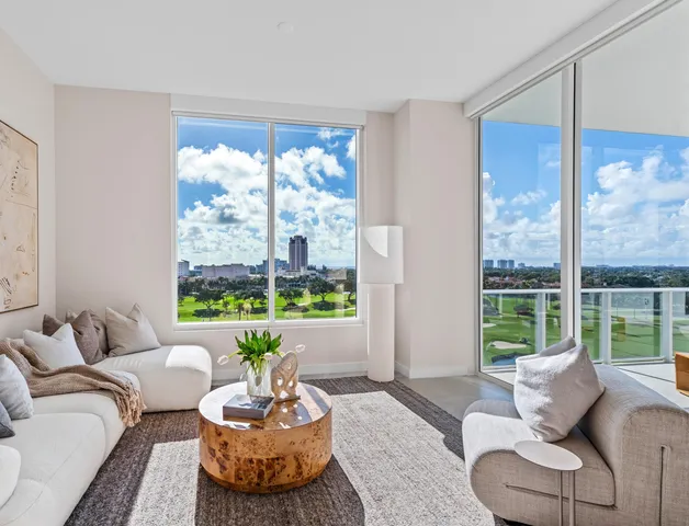 a large bathroom with a double vanity sink large mirror and a bathtub
