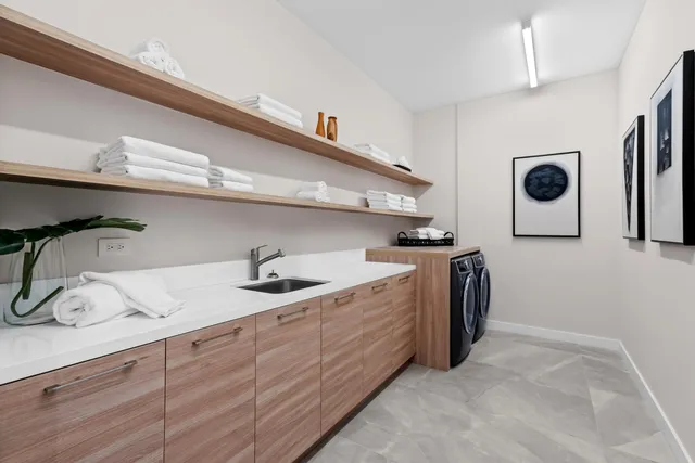 a view of a balcony with chair and table