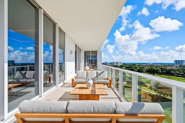 a view of a two chairs in the roof deck