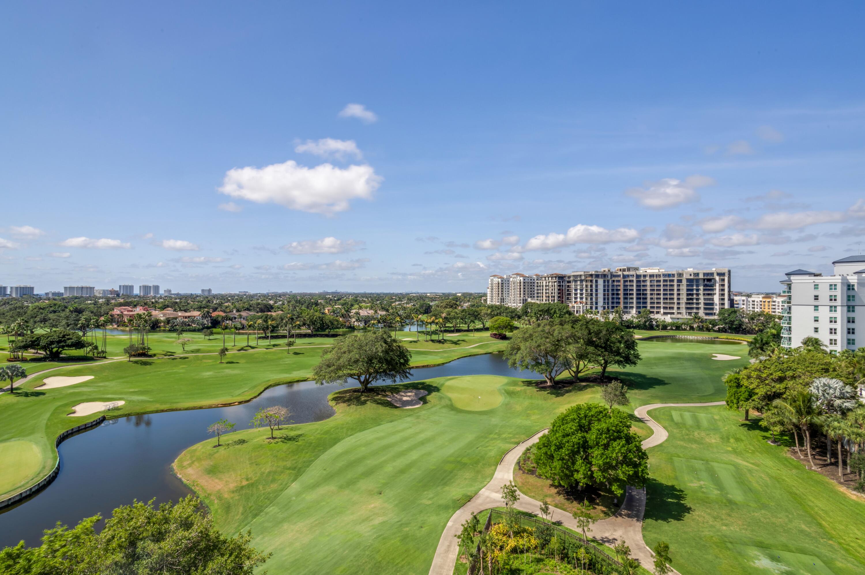 220 Southeast Mizner Boulevard, Unit PH24 Boca Raton, FL 33432 - Photo 36 of 51 a swimming pool with outdoor seating and yard