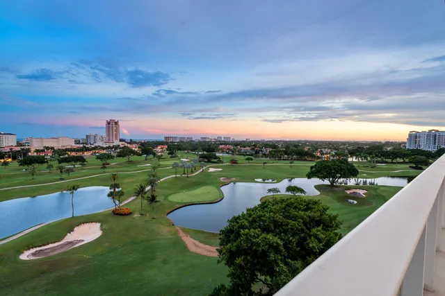 an aerial view of a golf course with swimming pool