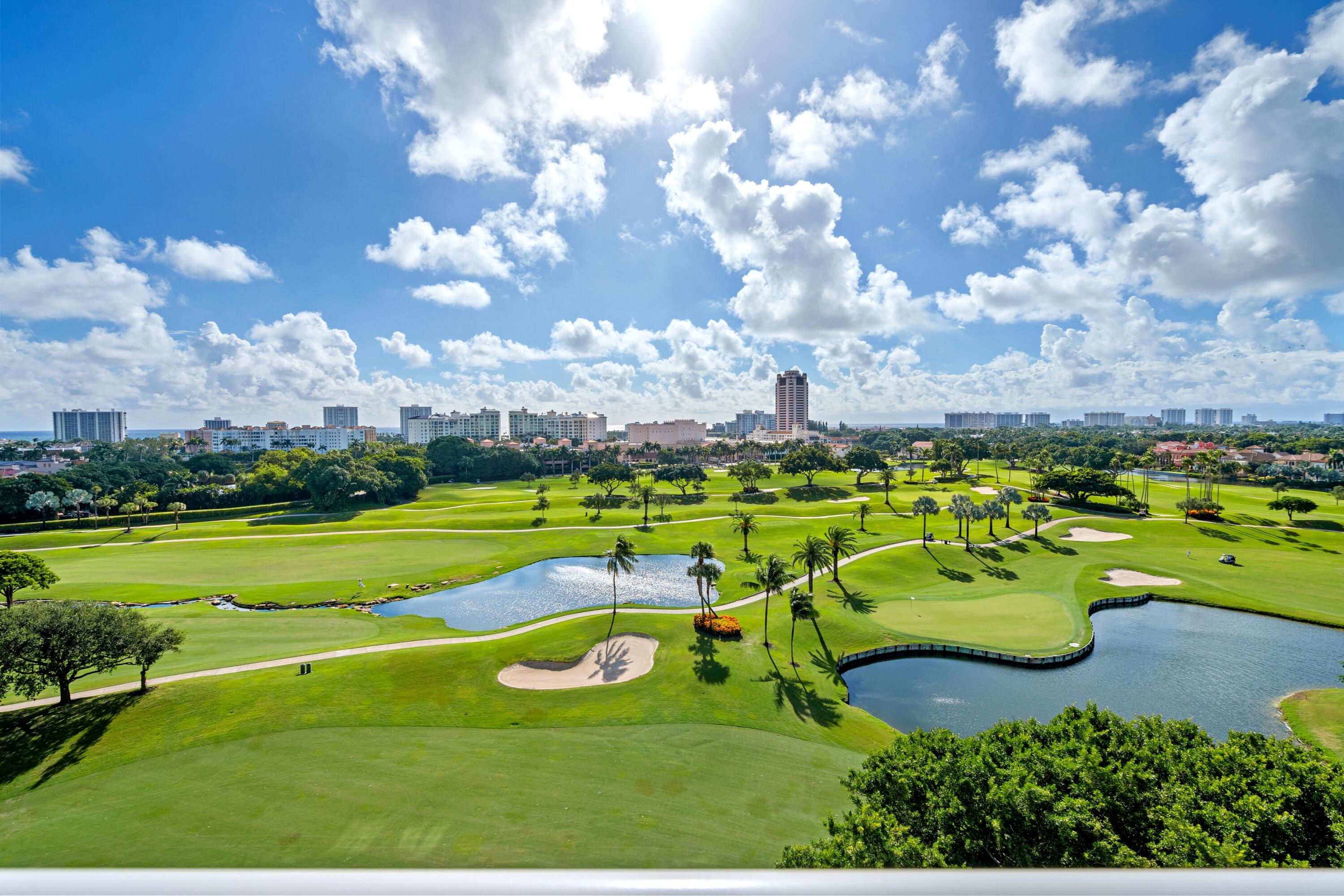 220 Southeast Mizner Boulevard, Unit PH24 Boca Raton, FL 33432 - Photo 4 of 51 a view of a golf course with a swimming pool