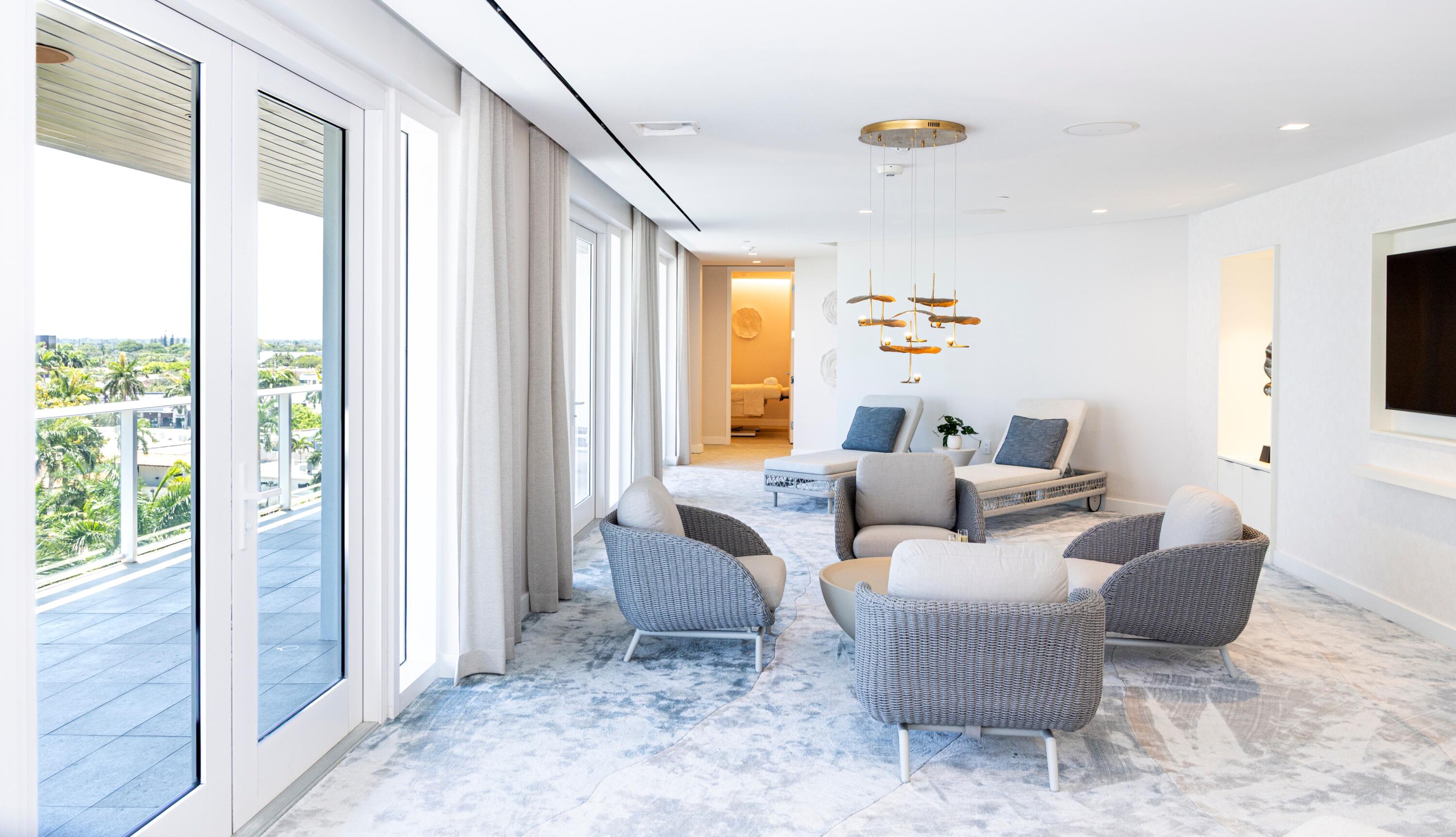 220 Southeast Mizner Boulevard, Unit PH24 Boca Raton, FL 33432 - Photo 43 of 51 a living room with furniture and a large window