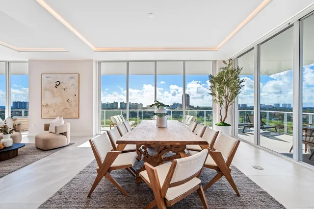 a terrace with outdoor seating and couches