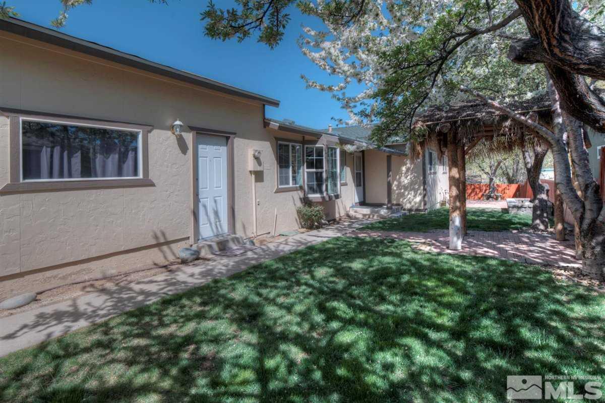 2975 Andrea Street Reno, NV 89503 - Photo 2 of 28 a backyard of a house with lots of green space