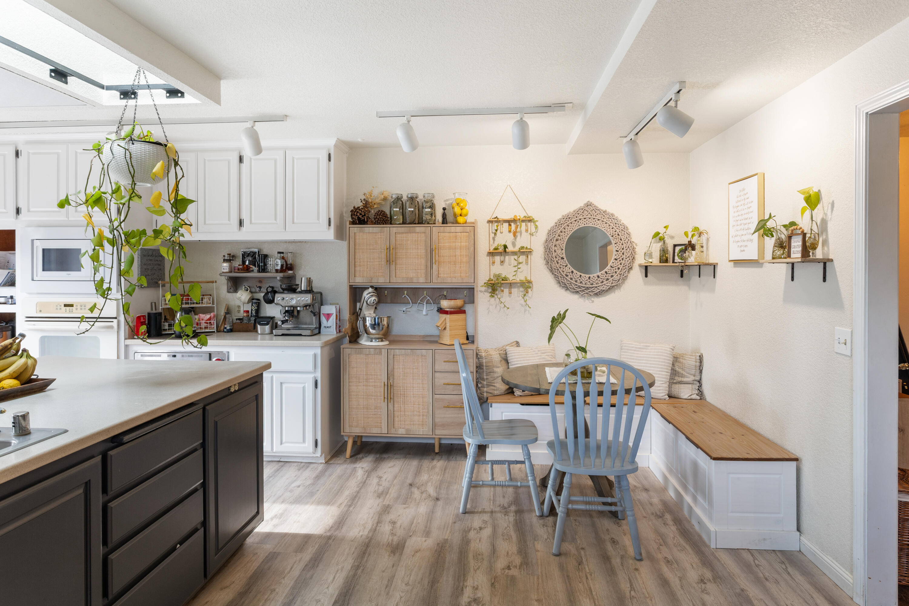 771 Flower Ash Lane Redding, CA 96003 - Photo 5 of 24 a kitchen with cabinets and wooden floor