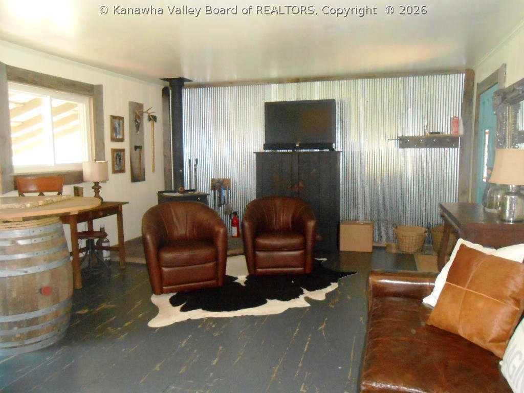706 Reedyville Road Spencer, WV 25276 - Photo 20 of 30 Family Room Area - Wood-Burning Stove in Corner