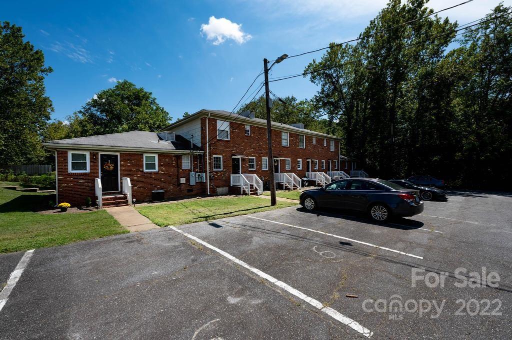 1219 County Home Road Conover, NC 28613 - Photo 11 of 48 a house view with a sitting space and garden