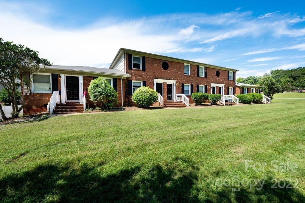 1219 County Home Road Conover, NC 28613 - Photo 14 of 48 a front view of house with yard and green space