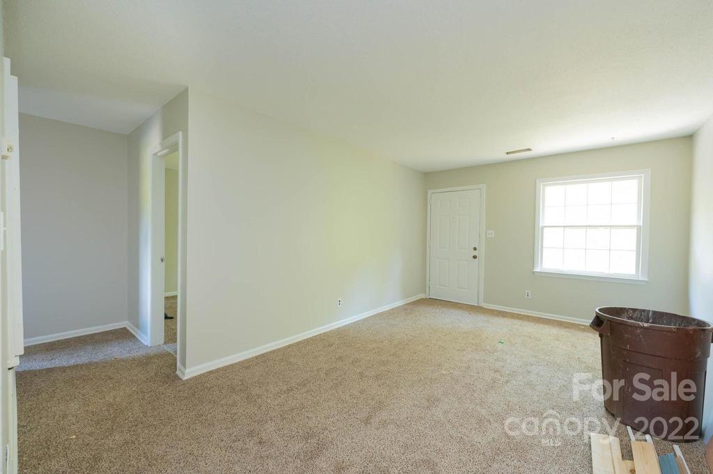 1219 County Home Road Conover, NC 28613 - Photo 20 of 48 an empty room with a window