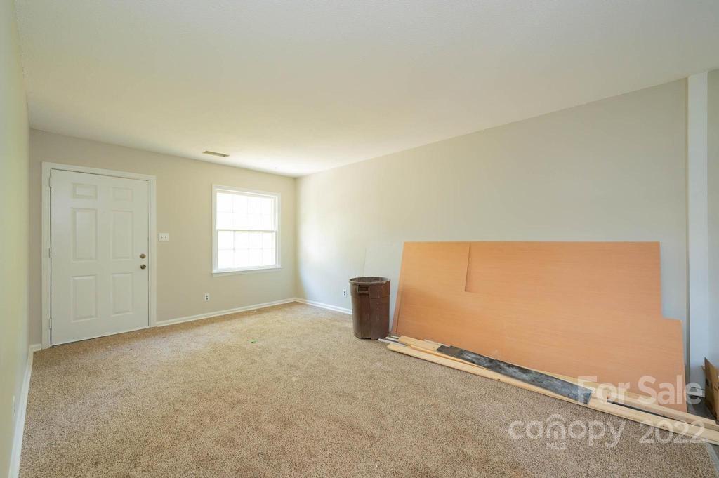 1219 County Home Road Conover, NC 28613 - Photo 21 of 48 an empty room with windows