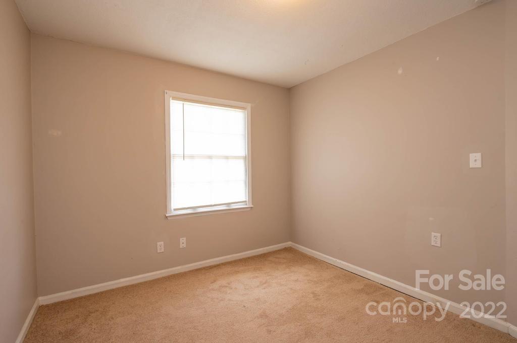 1219 County Home Road Conover, NC 28613 - Photo 33 of 48 an empty room with a window