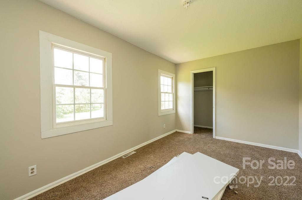 1219 County Home Road Conover, NC 28613 - Photo 42 of 48 a view of an empty room with a window