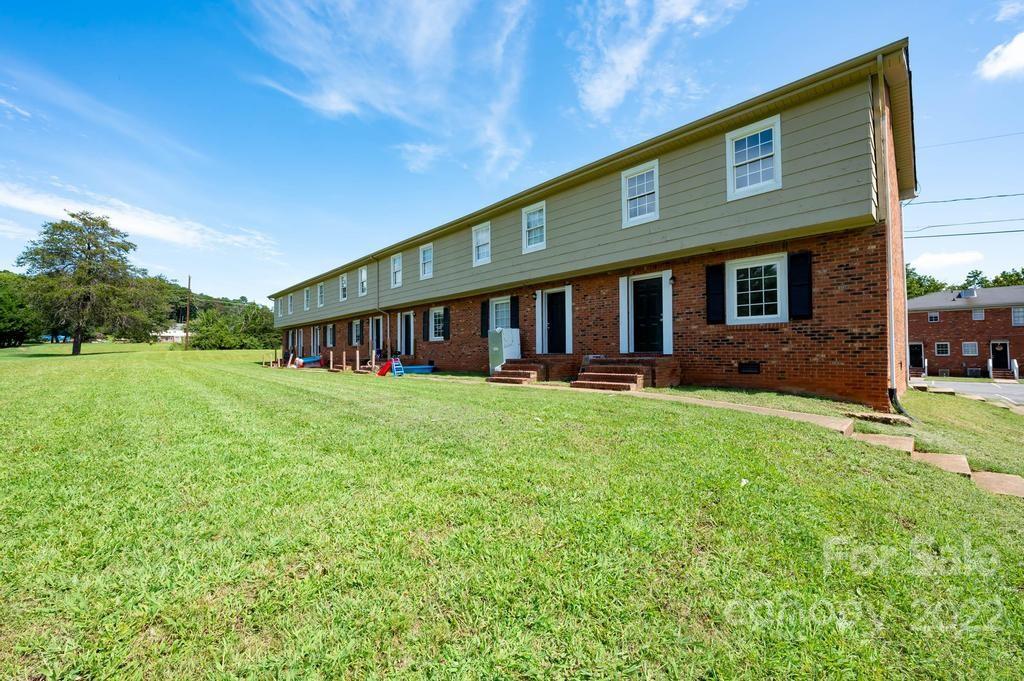 1219 County Home Road Conover, NC 28613 - Photo 6 of 48 a view of a house with backyard and porch