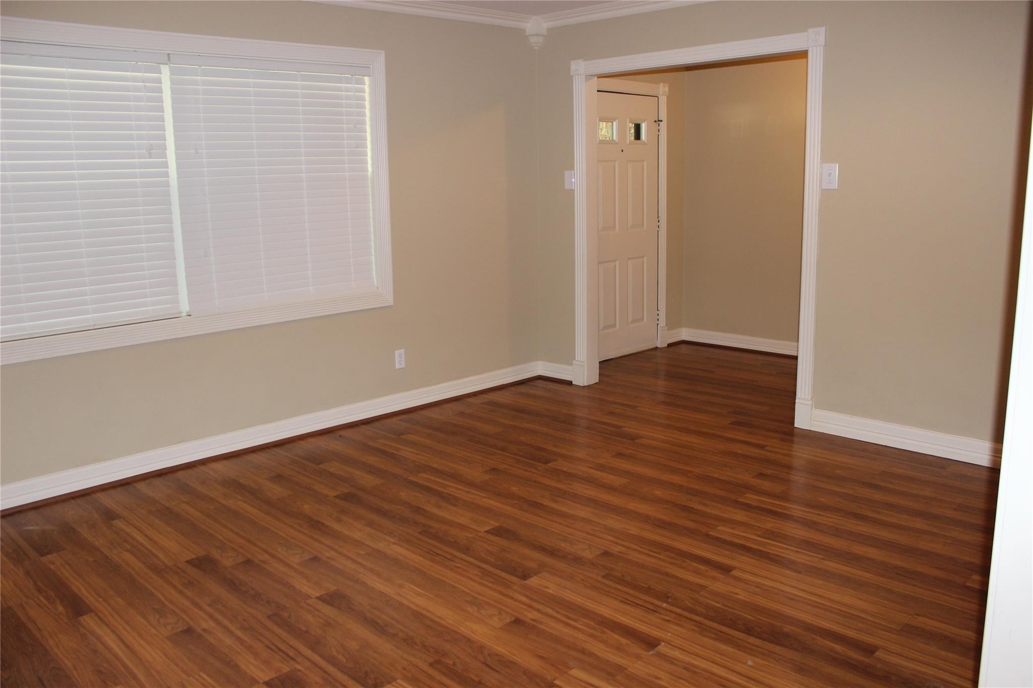 10301 Ivyridge Road Houston, TX 77043 - Photo 6 of 23 Family room view back towards the front door