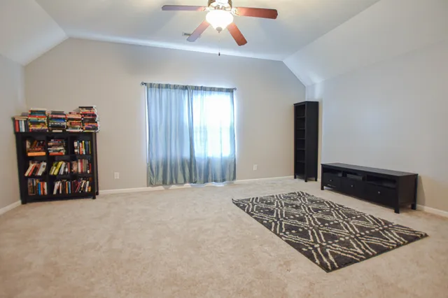 an entryway with a rug