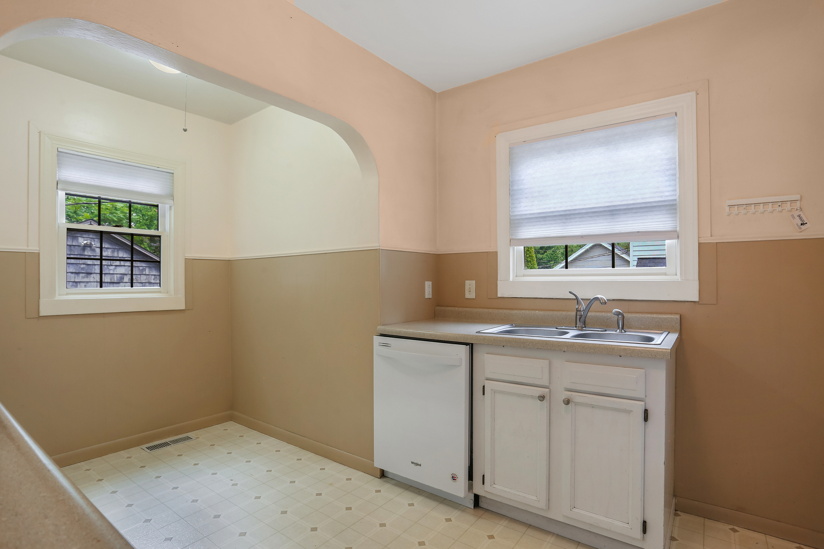 1206 West Healey Street Champaign, IL 61821 - Photo 13 of 42 a room with a sink cabinets and a window