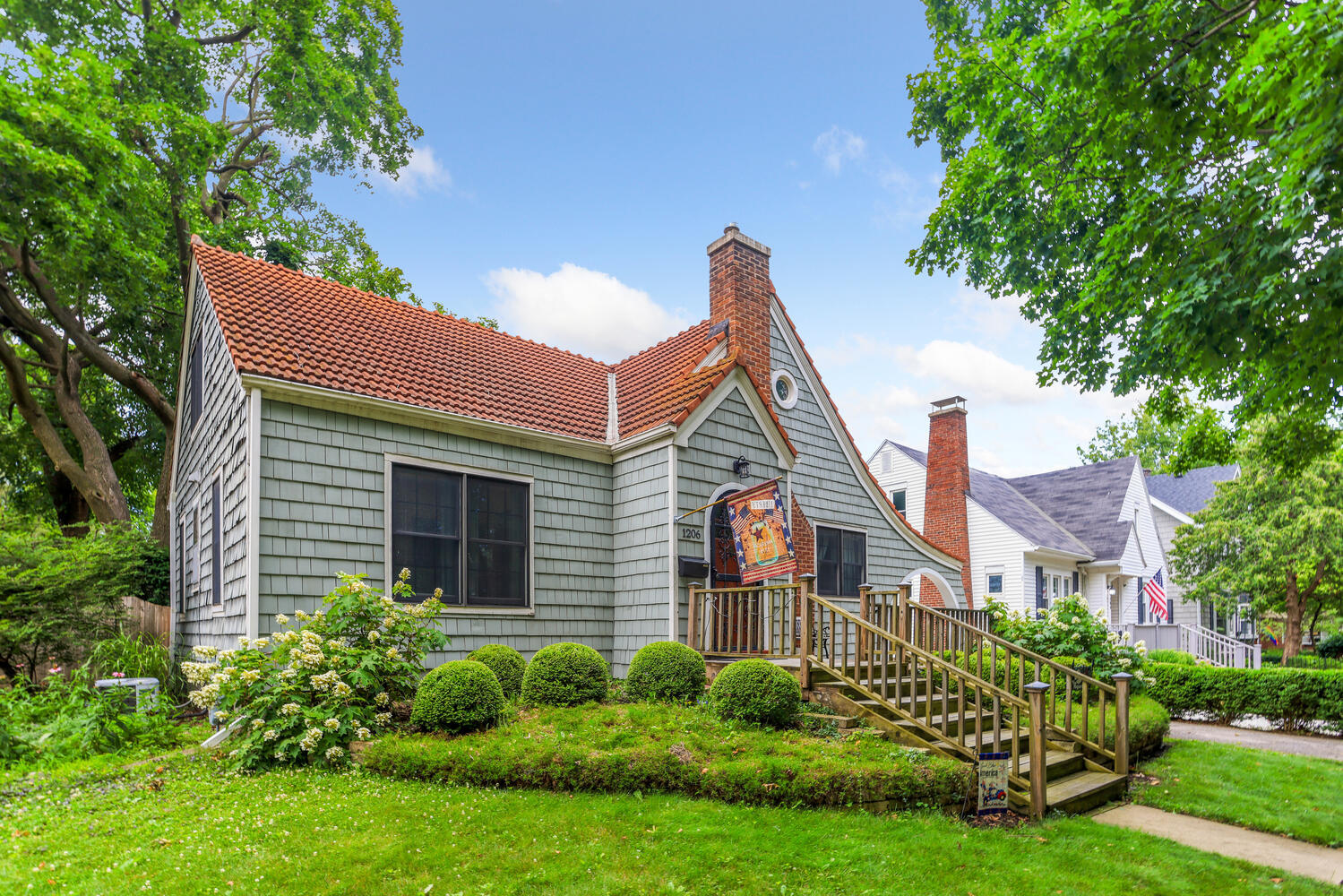 1206 West Healey Street Champaign, IL 61821 - Photo 2 of 42 a front view of a house with garden