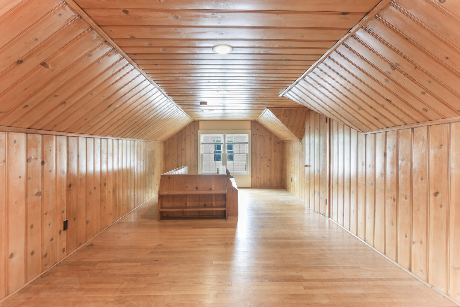 1206 West Healey Street Champaign, IL 61821 - Photo 22 of 42 a view of a livingroom with wooden floor and stairs