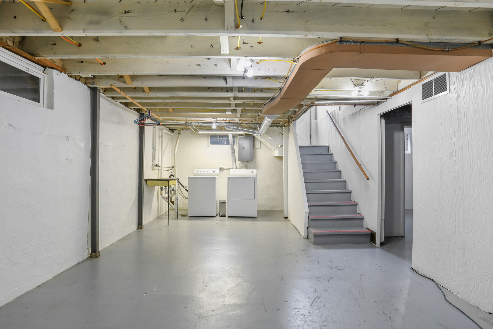 1206 West Healey Street Champaign, IL 61821 - Photo 28 of 42 a view of entryway and hall with wooden floor