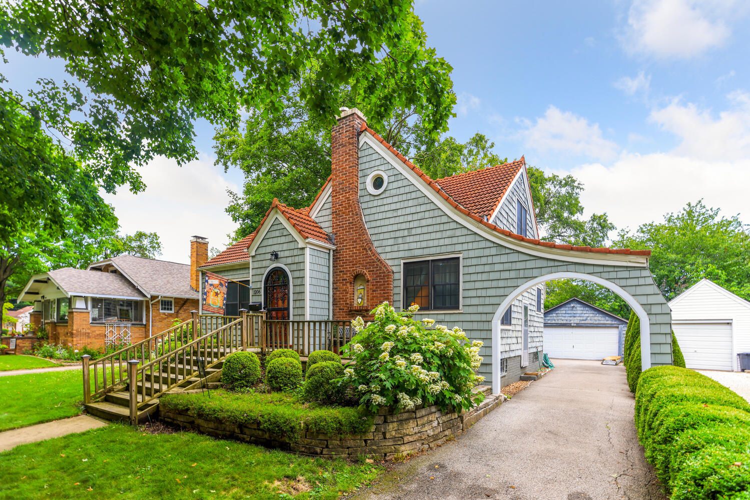 1206 West Healey Street Champaign, IL 61821 - Photo 32 of 42 a front view of a house with a garden and plants