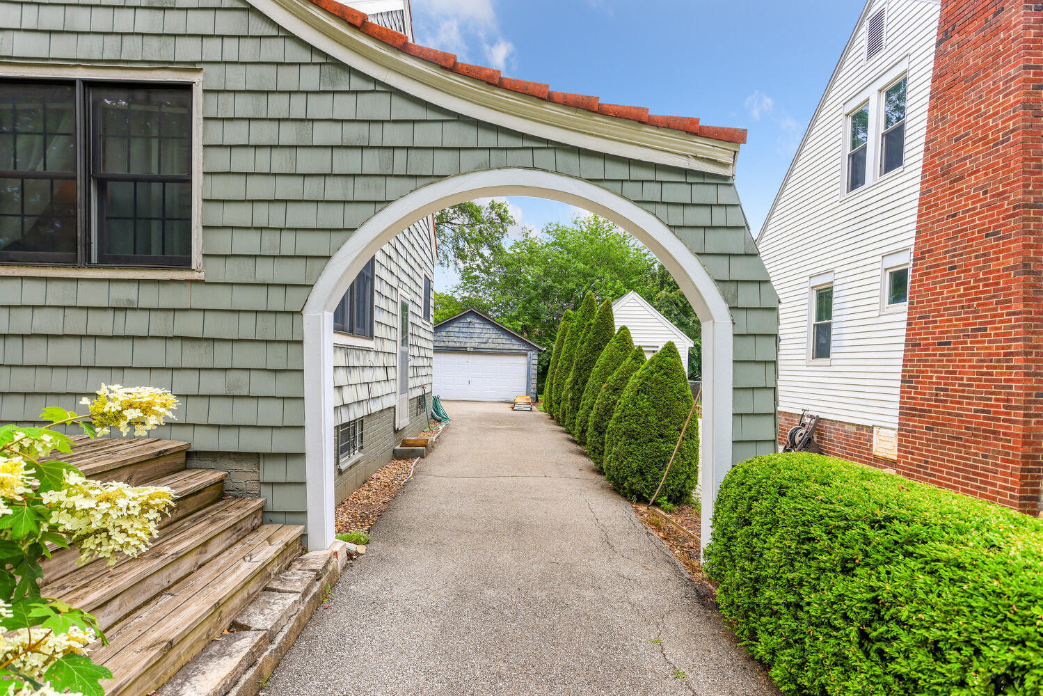 1206 West Healey Street Champaign, IL 61821 - Photo 33 of 42 a front view of a house with a garden