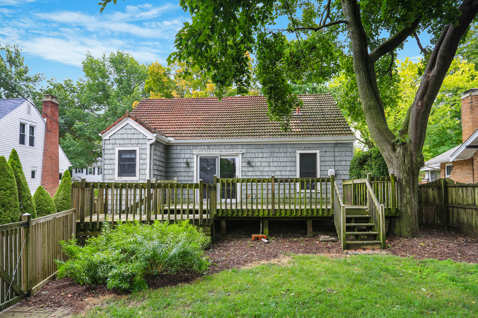 1206 West Healey Street Champaign, IL 61821 - Photo 35 of 42 a front view of a house with a garden