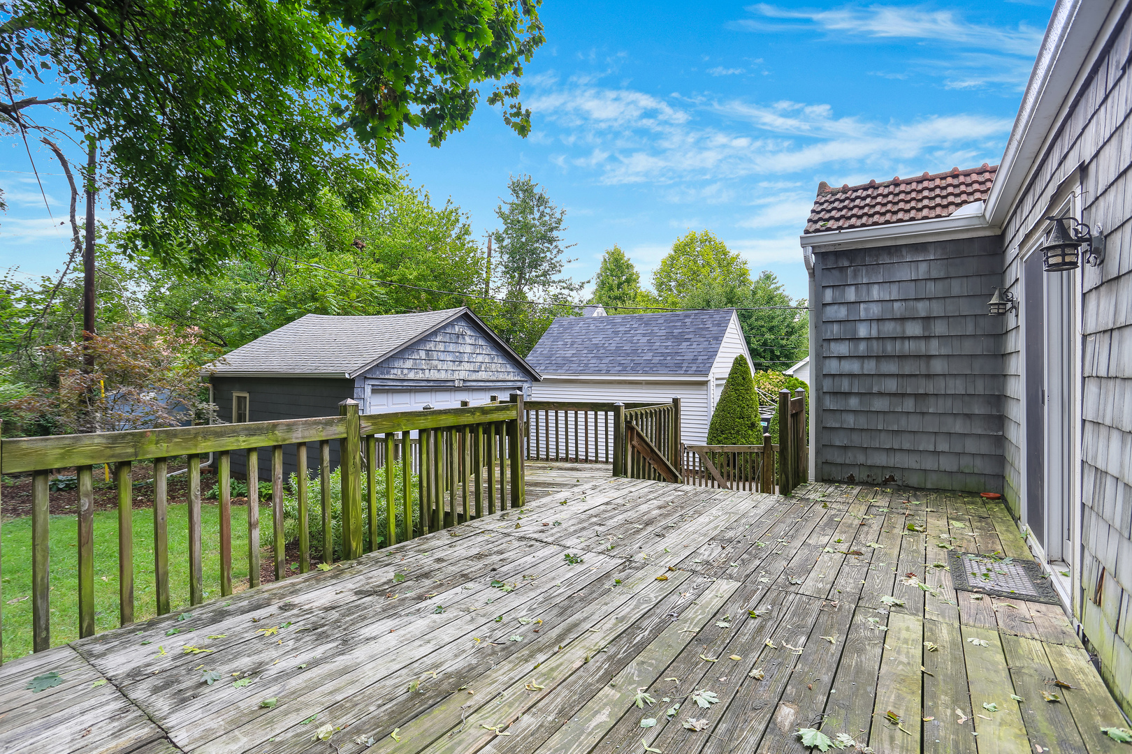 1206 West Healey Street Champaign, IL 61821 - Photo 37 of 42 a house view with a wooden floor and fence