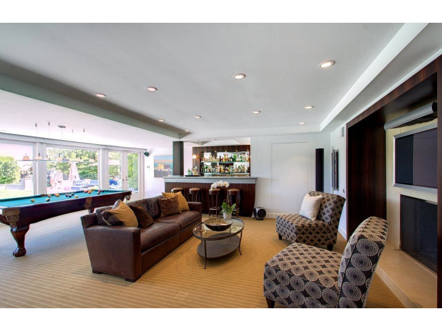 140 Eleanor Drive Woodside, CA 94062 - Photo 15 of 18 a living room with furniture and a large window