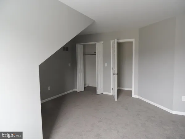 a view of a house with wooden stairs